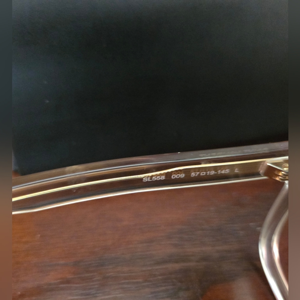 Yves Saint Laurent Gold Glasses